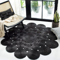 Round Rug — 4-foot round design in a black tone. Hand-woven to capture the rustic charm of farmhouse country style. Perfectly suited for placement in high-traffic areas such as living rooms and bedrooms.